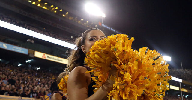 watch:-arizona-state-cheerleader-shoved-to-the-ground,-hit-by-cops-after-interfering-arrest