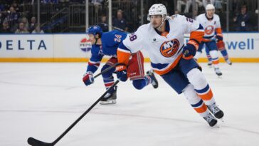 alexander-romanov-tears-acl-in-another-brutal-injury-blow-for-islanders-defenseman