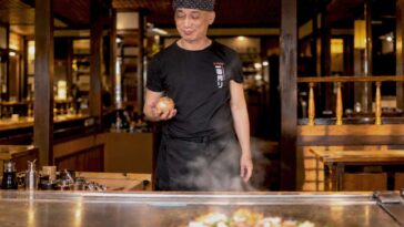 grinning-teppanyaki-chef-clearly-has-something-clever-planned-for-onion