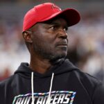 buccaneers-coach-todd-bowles-suffers-health-scare-after-taking-helmet-to-the-stomach-during-celebration