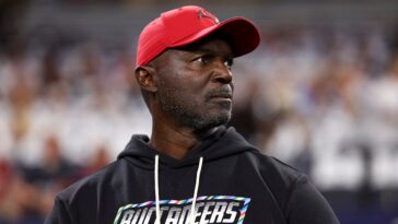 buccaneers-coach-todd-bowles-suffers-health-scare-after-taking-helmet-to-the-stomach-during-celebration