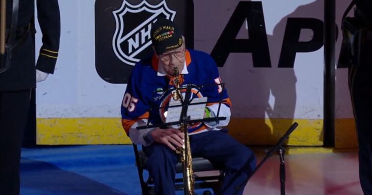 watch:-hockey-crowd-goes-wild-when-wwii-vet,-105,-who-fought-under-patton-performs-nat’l-anthem-on-rink