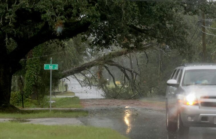 hurricane-isaias-weakens-after-killing-two,-leaving-hundreds-of-thousands-without-power