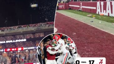 fans-throw-drinks-at-georgia-players-after-alabama-loss-in-wild-scene