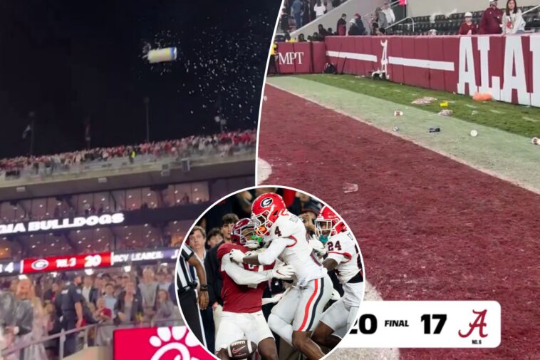 fans-throw-drinks-at-georgia-players-after-alabama-loss-in-wild-scene