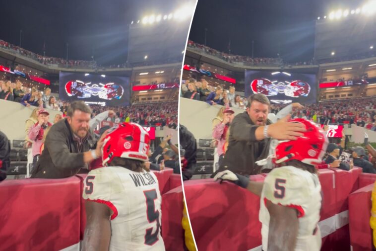 alabama-fan-smacks-georgia-player-on-helmet-in-stunning-scene