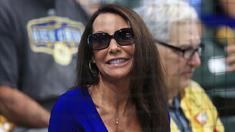 bright-lights-not-too-bright-for-the-brewers-or-superfan-front-row-amy-in-game-1-of-nlcs