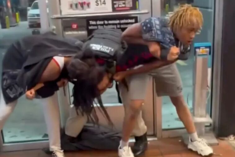 shocking-video-shows-2-women-leap-on-top-off-duty-cop-at-gas-station-—-before-trying-to-snatch-his-gun
