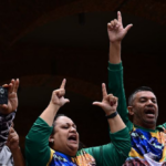 brazil:-far-left-supporters-of-lula-da-silva-trash-sao-paulo-train-stations,-burn-us.-flag