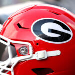 watch:-alabama-fan-hits-georgia-player-in-the-head-after-controversial-win