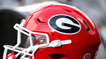 watch:-alabama-fan-hits-georgia-player-in-the-head-after-controversial-win