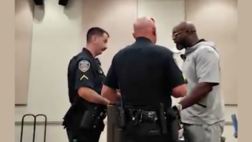 pastor-removed-from-north-carolina-school-board-meeting-after-reading-from-library-book-available-to-students-(video)