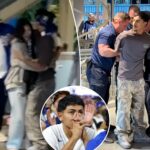 dodgers-fans-caught-in-ugly-friendly-fire-brawl-after-nlcs-game-3-loss