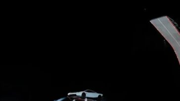 musk-unveils-flying-tesla-roadster-at-spacex-texas-site