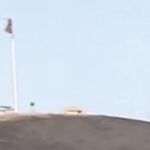 amazing!-american-flag-still-flying-on-top-of-patriots-hill-in-orange-county-after-fire-torches-hillside-(video)