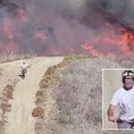 frightening-moment-cyclists-run-into-wall-of-flames-from-socal-wildfire