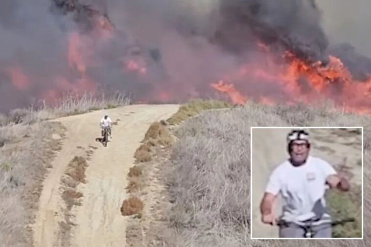 frightening-moment-cyclists-run-into-wall-of-flames-from-socal-wildfire