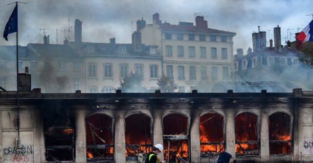 france-rioters-clash-with-police,-torch-lyon-tourism-office,-break-into-marseille-city-hall