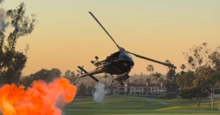 watch:-stunt-chopper-at-navy-seal-fundraiser-thrills-guests-with-small-explosions-and-red,-white-and-blue-smoke-show