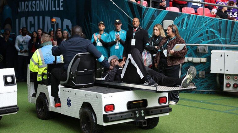 nfl-line-judge-takes-knee-and-appears-to-pray-after-umpire-collapses-during-jaguars-texans-london-game