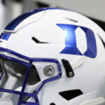 watch:-duke-player-under-fire-for-swatting-away-female-trainer