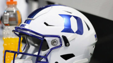 watch:-duke-player-under-fire-for-swatting-away-female-trainer