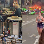 french-couple-casually-enjoy-a-smoke-and-a-drink,-jogger-runs-as-riot-fires-rage-around-them