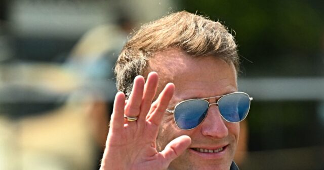 macron-bids-‘au-revoir’-to-burning-france,-flees-to-kuwait-for-middle-east-tour