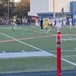 watch:-‘democrats’-football-player-levels-rival-carrying-american-flag-in-dirty-pre-game-hit