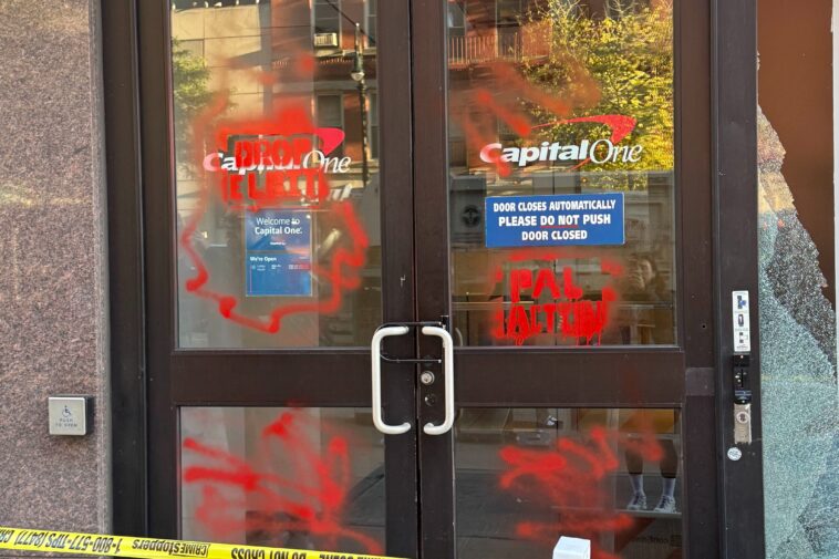 window-of-ues-bank-smashed,-facade-marred-with-red-graffiti-in-possible-hate-crime:-cops