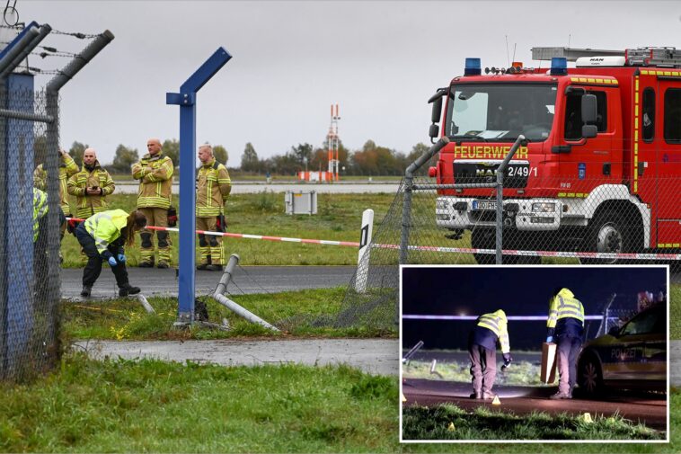 german-police-say-2-men-turned-themselves-in-after-smashing-their-car-into-an-airport-fence