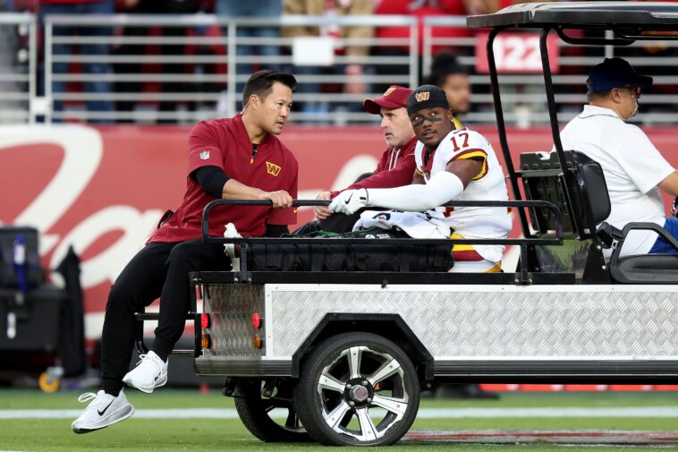 terry-mclaurin-carted-off-field-with-apparent-knee-injury-in-potential-commanders-nightmare