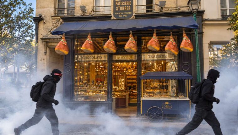 french-shop-owners-hang-hams-over-doorposts-so-rioters-will-pass-them-by