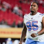 titans-player-jordan-elliott-got-angry-at-teammate,-went-to-his-car-for-a-gun-and-ended-up-unemployed