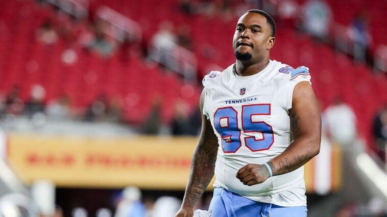 titans-player-jordan-elliott-got-angry-at-teammate,-went-to-his-car-for-a-gun-and-ended-up-unemployed