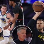 injuries,-kristaps-porzingis-cast-a-cloud-over-warriors’-season-opener