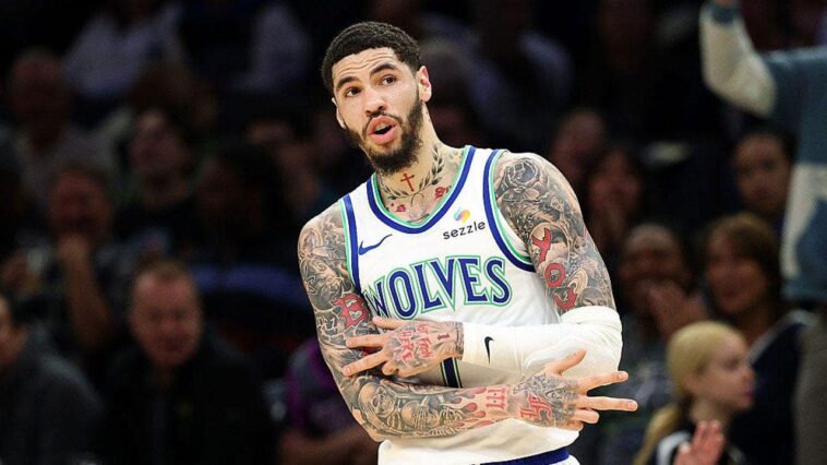 lamelo-ball-gets-away-with-egregious-travel-during-timberwolves-season-opener,-immediately-trash-talks-fans