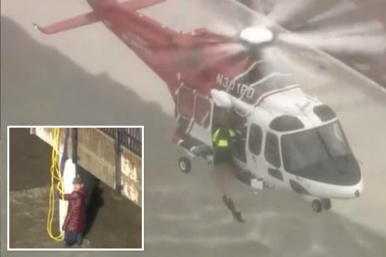 raging-floodwaters-sweep-several-into-overflowing-la-channel,-prompting-dramatic-rescue