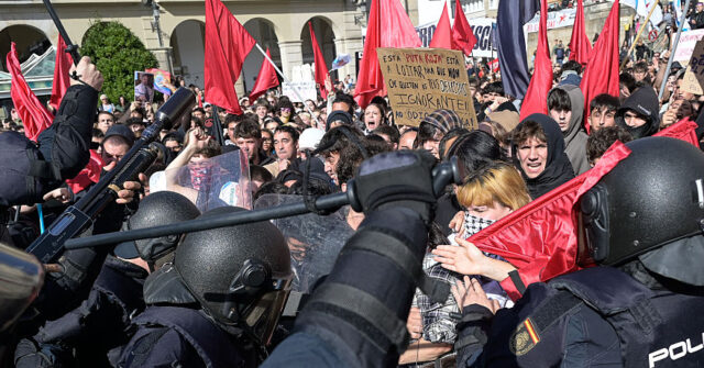 watch:-spanish-far-left-rioters-try-to-crash-vox-party-rally-in-a-coruna,-stage-night-of-chaos