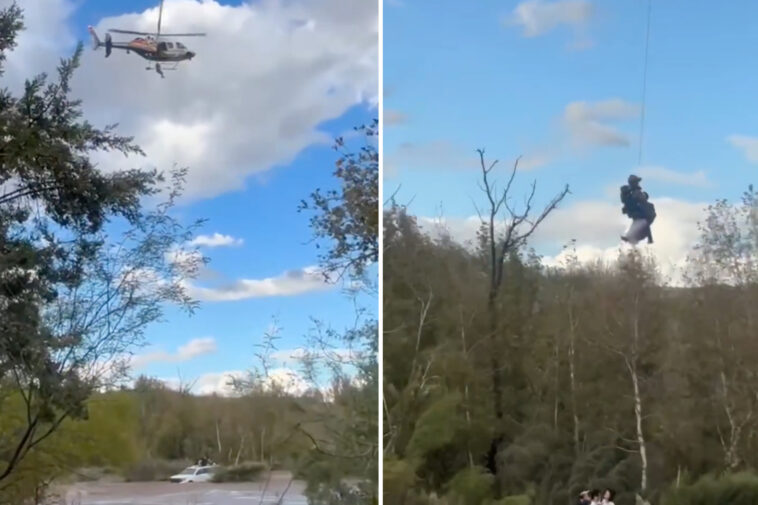terrified-drivers-trapped-in-flash-flood-saved-in-dramatic-helicopter-rescue