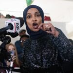 watch:-reporters-swarm-‘ilhan-omar’-as-she-appears-in-public-for-first-time-since-raid