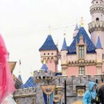 watch:-rare-sudden-downpour-sends-disneyland-parkgoers-scrambling