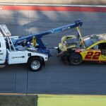 nascar’s-joey-logano-rides-on-his-roof,-riley-herbst-nails-wall-at-full-speed-in-dangerous-talladega-wreck