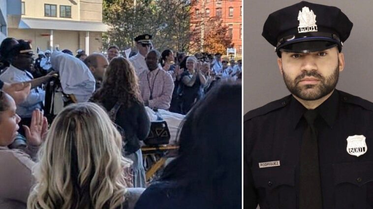 shot-12-times-in-ambush-that-killed-his-partner,-philadelphia-officer-leaves-hospital-to-cheers