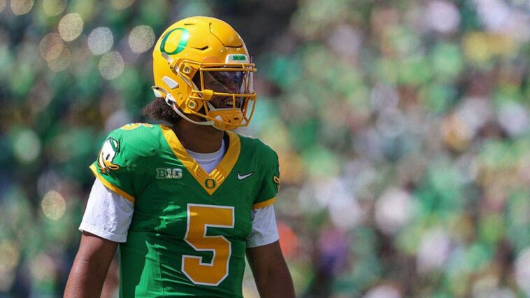 dante-moore-won’t-quit-on-oregon,-but-concussion-will-keep-star-qb-out-of-games-moving-forward-for-ducks