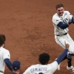 rays-stay-alive-in-world-series,-walk-off-brewers-in-thrilling-extra-inning-game-4