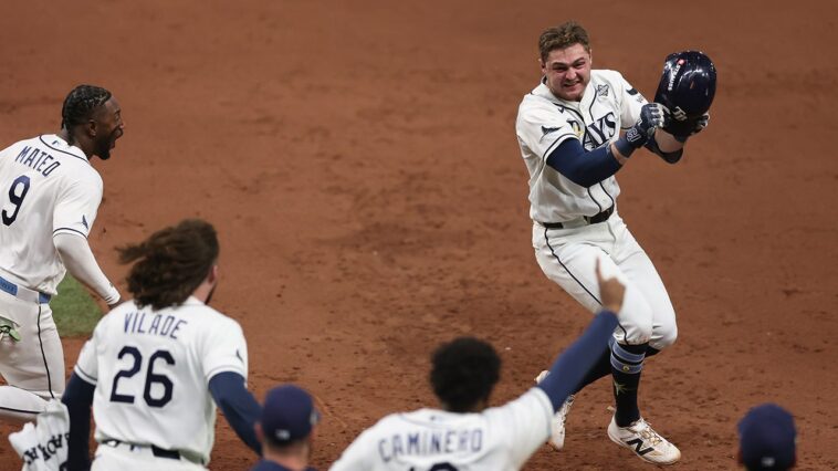 rays-stay-alive-in-world-series,-walk-off-brewers-in-thrilling-extra-inning-game-4