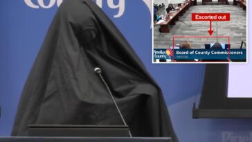 woman-wearing-burka-escorted-out-of-florida-county-meeting-after-playing-call-to-prayer-recording